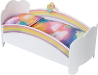 Bébé born dans un lit arc-en-ciel